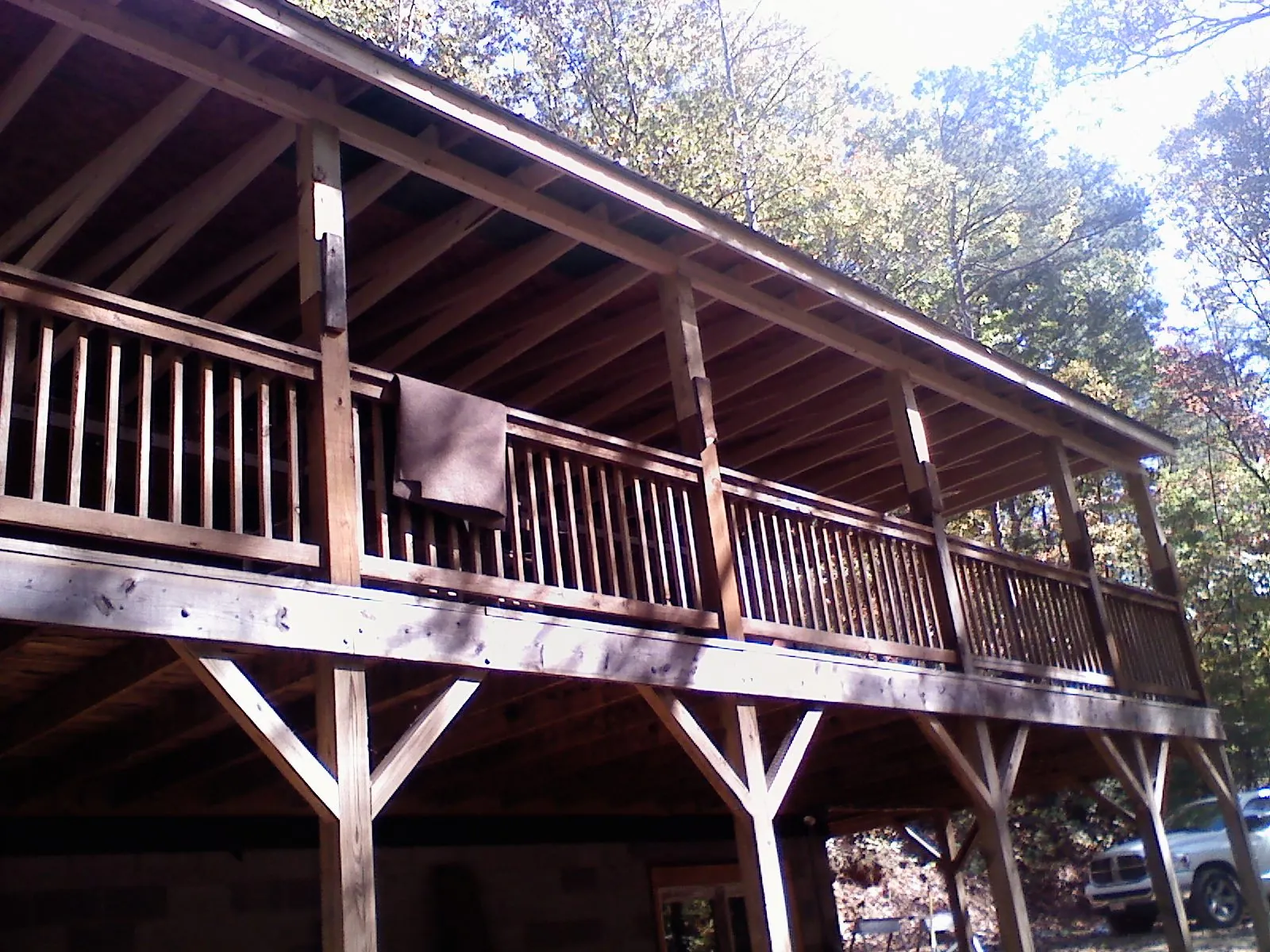 Timber framing under a new elevated porch and deck — Roof Leak Repair in Hematite by Roofing Brothers